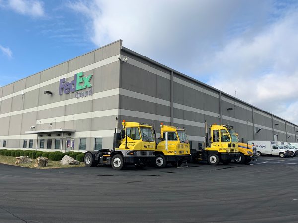FedEx Building with Yellow Trucks