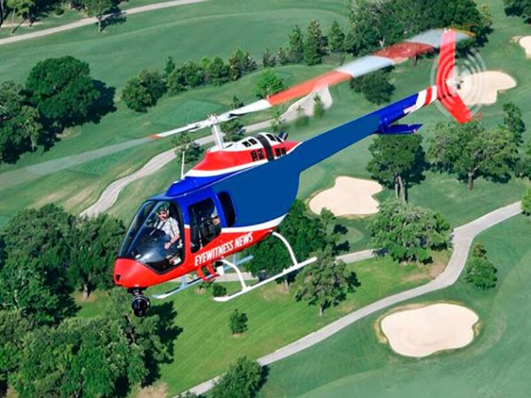 KCPS helicopter in the air over a golf course
