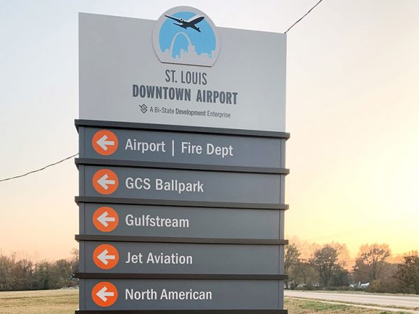 Sign showing various directions to locations