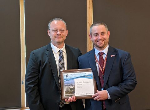 Erick Dahl and Clayton Stambaugh with the Reliever Airport of the Year award certificate.