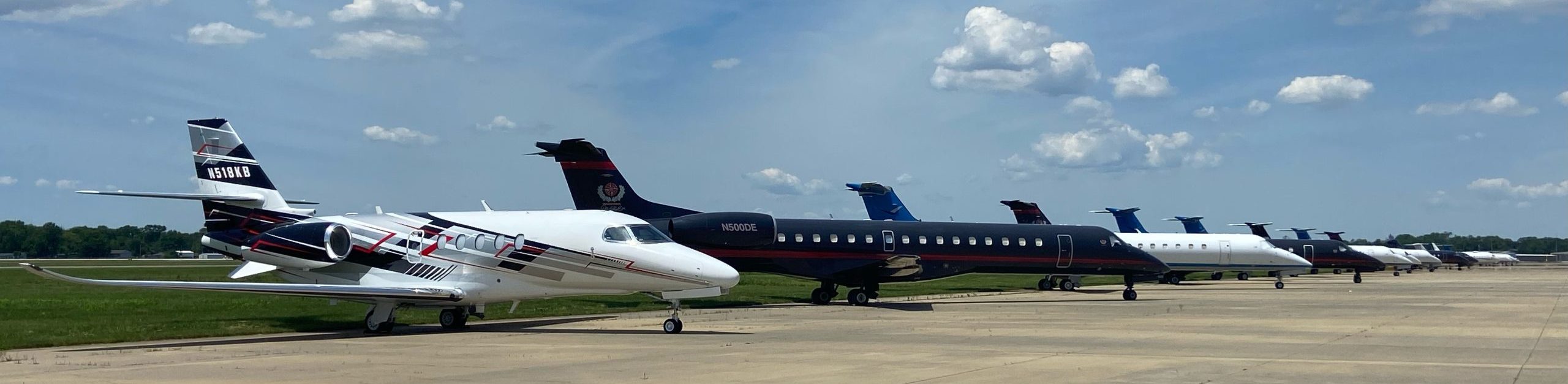 Jets parked on the tarmac at St. Louis Downtown Airport.