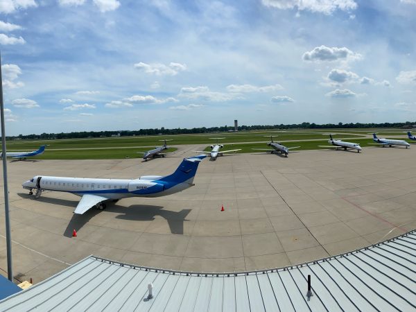 Panoramic photo of planes parked at the St. Louis Downtown Airport.