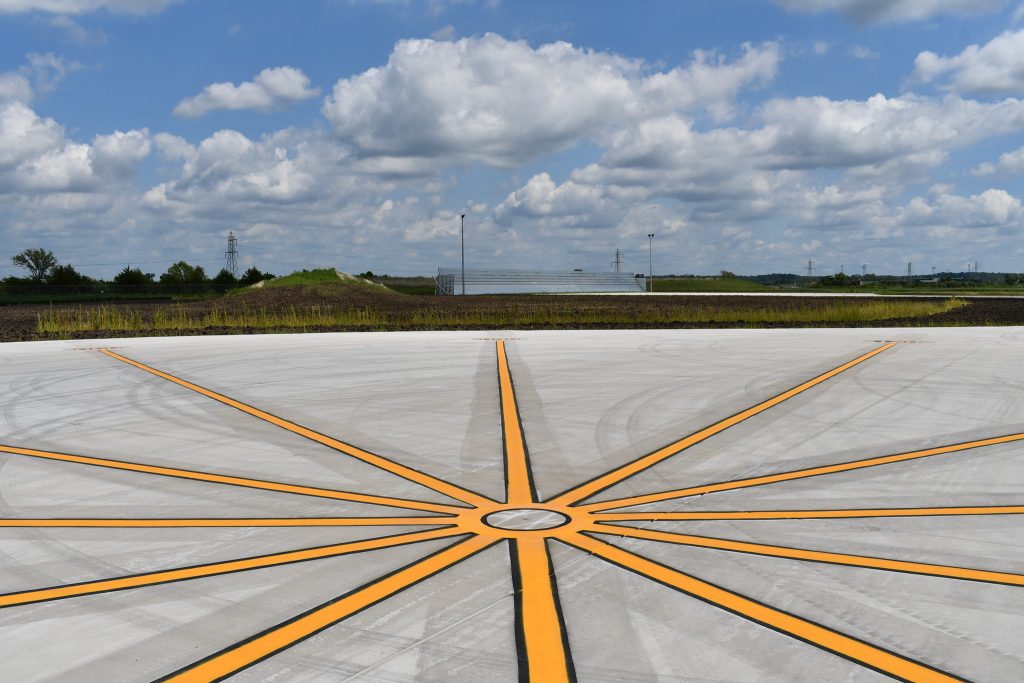 Photo of the new Compass Calibration Pad at St. Louis Downtown Airport with the Ground Engine Run-Up Area in the background