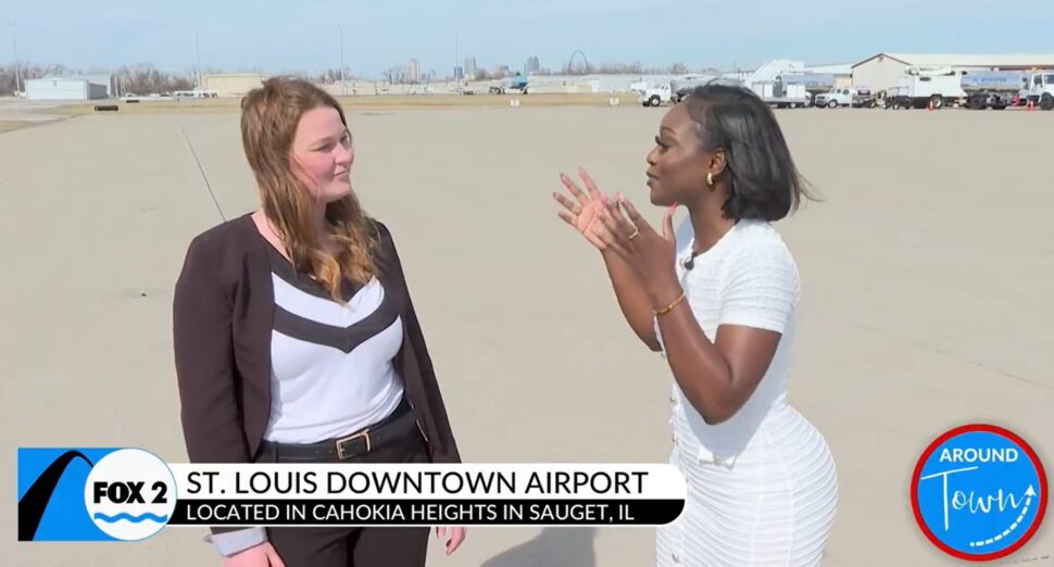 Photo of Airport Director Sandra Shore talking to Britney from KTVI Fox 2 on the tarmac at St. Louis Downtown Airport
